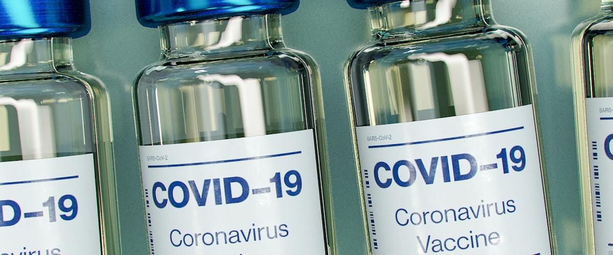 COVID-19 vaccine vials - NHS COVID-19 vaccination at Barons Court Pharmacy